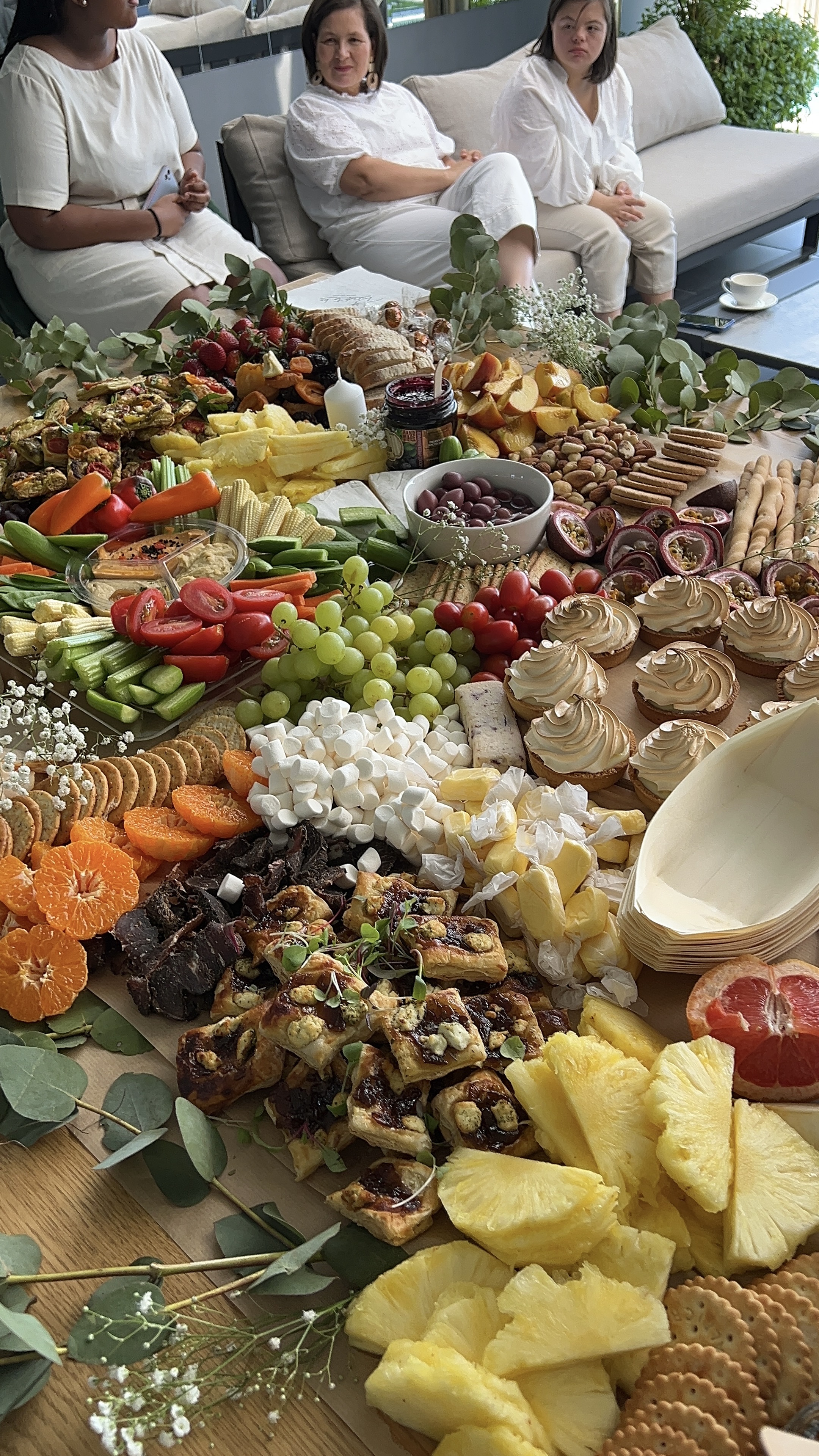 A grazing table with guests